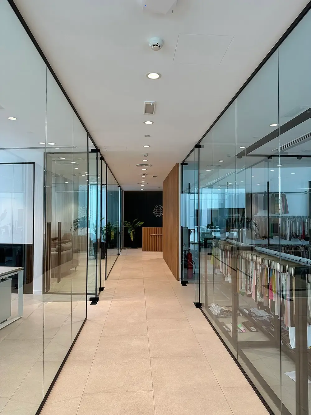 Glass-walled corridor between offices, Global Textiles office, Opus Tower, Dubai