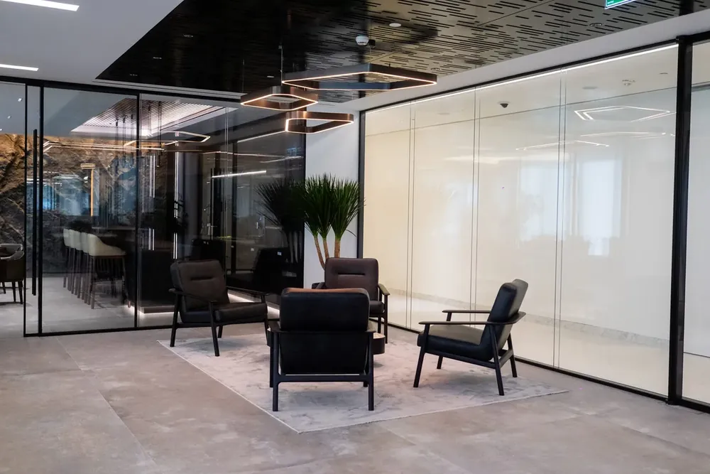 Photograph: the IMI lounge behind glass after handover, One Za’abeel, Dubai