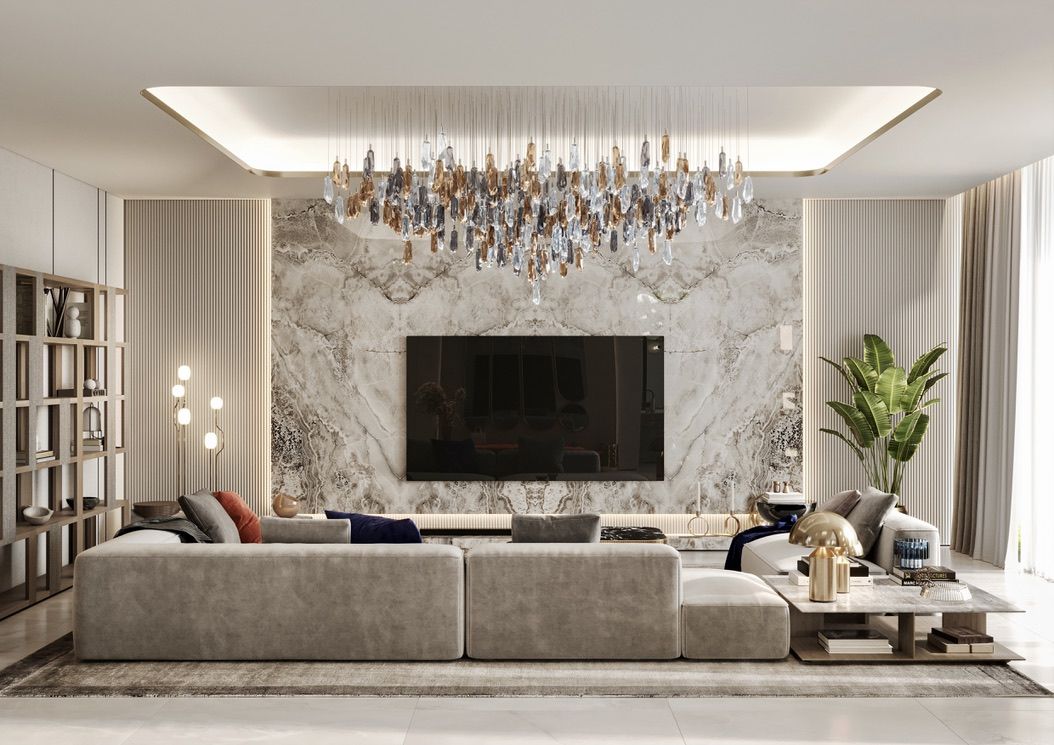 Render of the living room at Villa 389: a deep sofa facing a marble media wall under a crystal chandelier