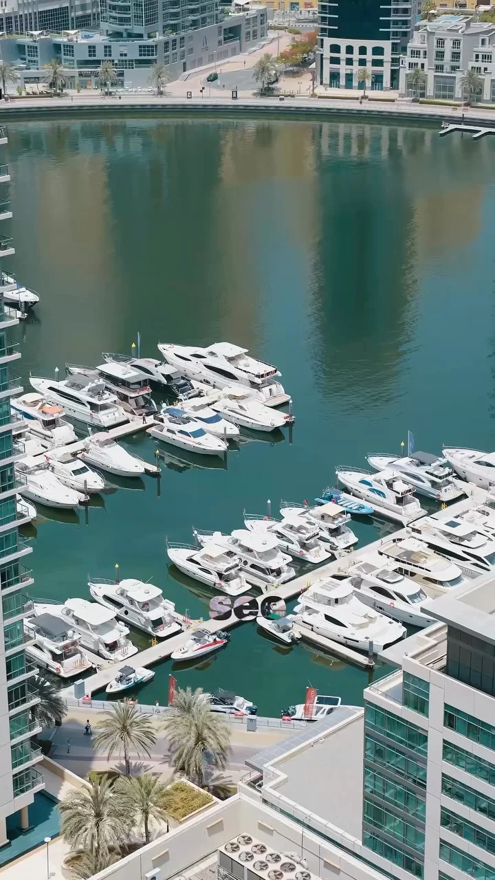 View over Dubai Marina from a high floor at Marina Mansions, from a Fajr Interiors reel