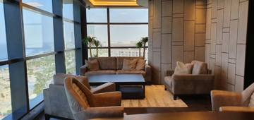 Client lounge delivered by Fajr Interiors for AlSubeai, Dubai