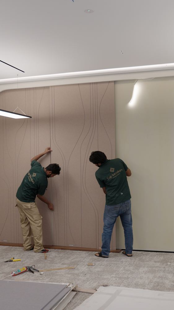 Acoustic wall build-up going in on an office floor, Fajr Interiors site team, Dubai