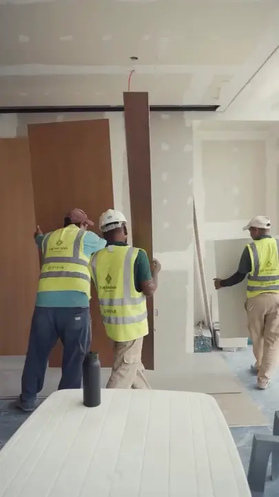 Site meeting on a Fajr Interiors office fitout, joinery going up, Dubai