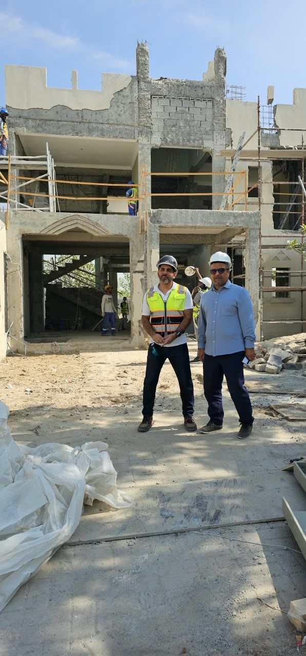 The owner on site at Cluster 39, Villa 3 with the Fajr team, in hard hats, during construction