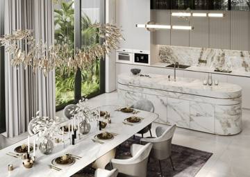 Render of the kitchen at Villa 389: a curved marble island beside the dining table, garden beyond