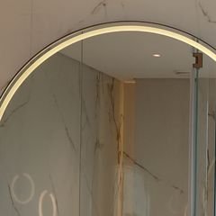 Lit mirror, from the bathroom photo