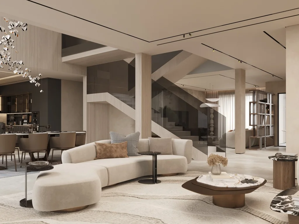 Render: living room with a curved cream sofa, a marble-topped coffee table and a stair behind a smoked-glass balustrade