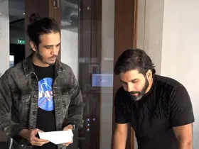 Fajr Interiors team reviewing drawings at a table, planning stage