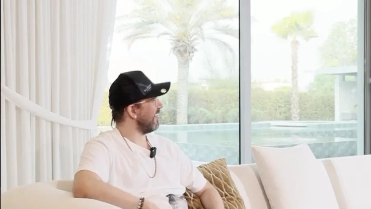 Villa 47 Fairways, Dubai Hills: the living room by the pool window, from the client film
