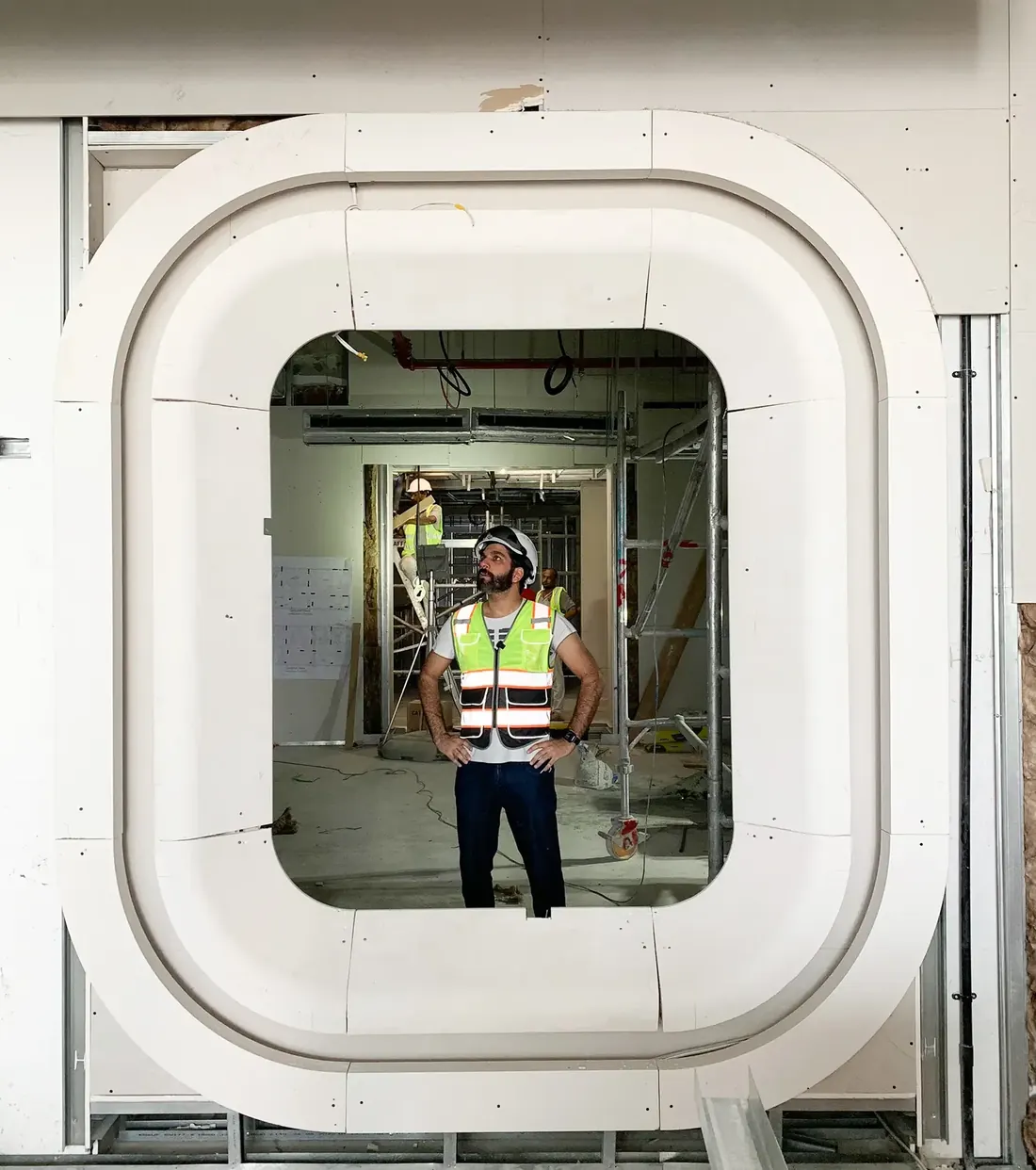 The Fajr Interiors founder in a hi-vis vest on a site under construction, Dubai
