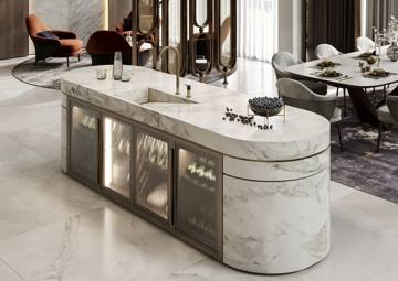 Render of the kitchen island at Villa 389: a rounded marble island with lit glass fronts