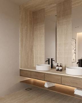 Render of the double vanity at Cluster 7, Villa 14: travertine panels and a floating timber counter