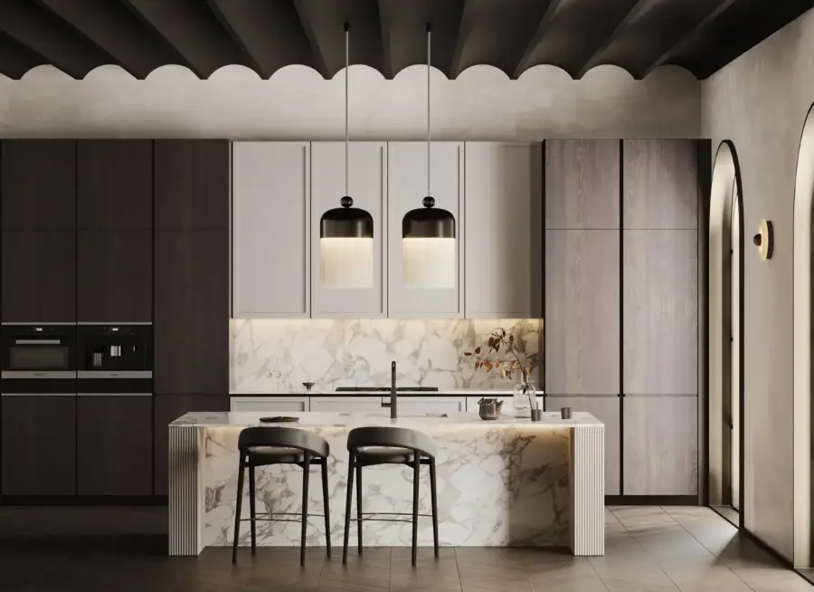 Villa kitchen with a stone island, bar stools and full-height joinery