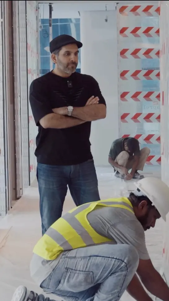 Fajr founder on site during a glazing installation in an office, Dubai