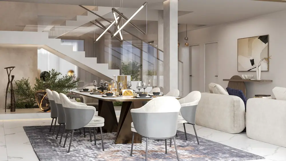 Dining table under a floating stair with a glass balustrade, beside the living room of Cluster 39, Villa 1, a Jumeirah Islands villa renovated by Fajr Interiors