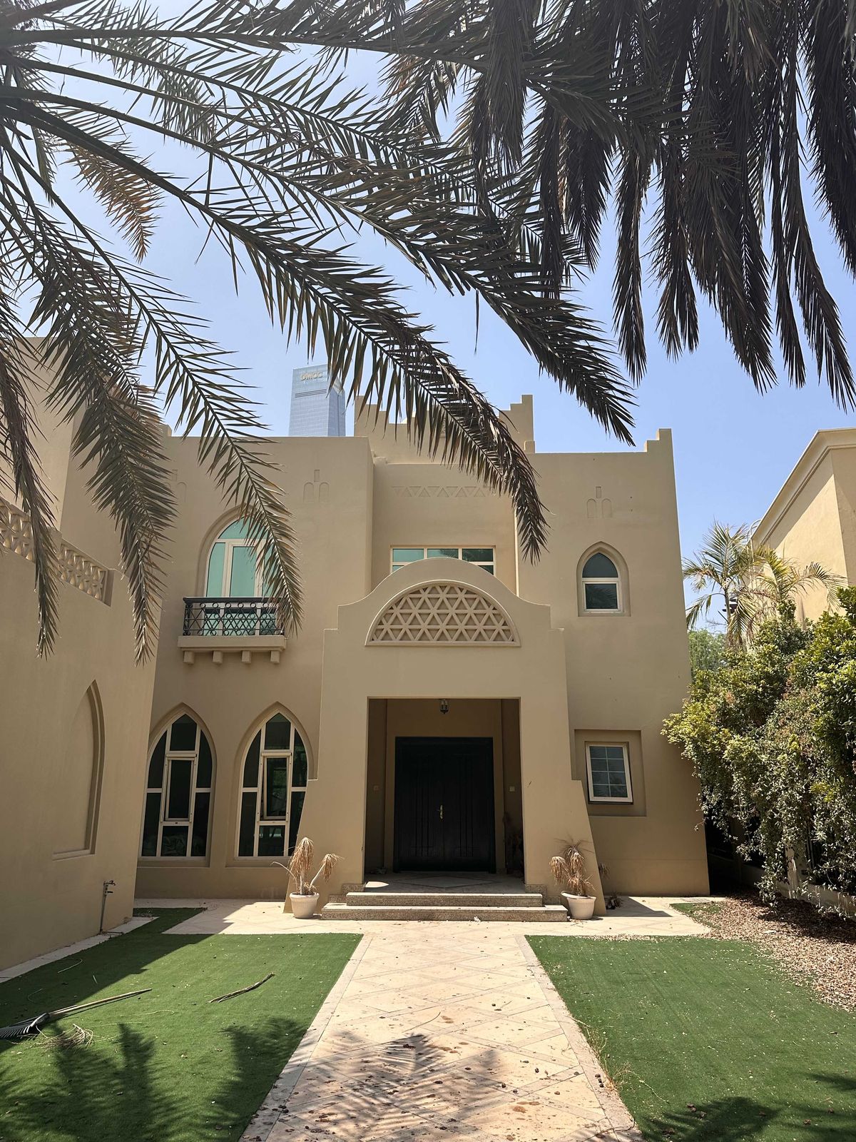 The entrance of Cluster 49, Villa 13, Jumeirah Islands, with its arched windows