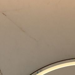 Book-matched marble wall, from the bathroom photo