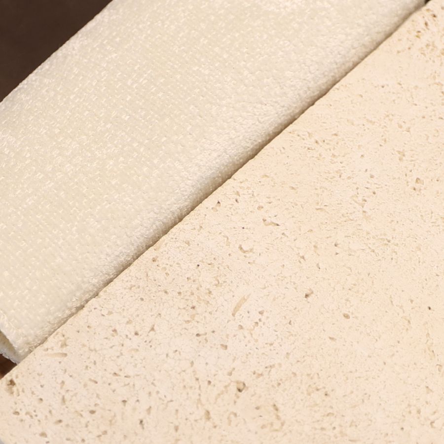 Travertine and stone samples on the studio table at Fajr Interiors