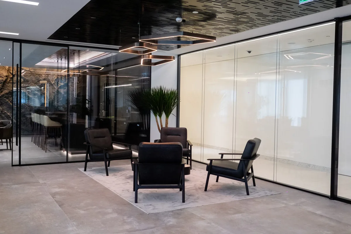 Photograph: the IMI lounge behind glass after handover, One Za’abeel, Dubai