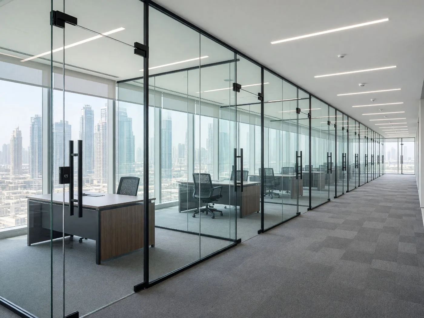Concept visualisation: a line of glass-fronted private offices along the window, in good condition