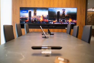 Photograph: boardroom, the screen wall, the IMI at One Za'abeel office fitout by Fajr Interiors