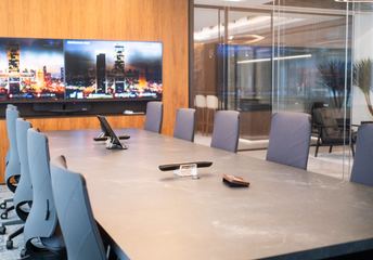 Photograph: boardroom table, the IMI at One Za'abeel office fitout by Fajr Interiors