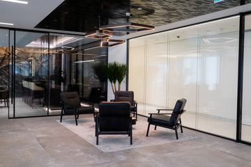 Photograph: lounge behind glass, the IMI at One Za'abeel office fitout by Fajr Interiors