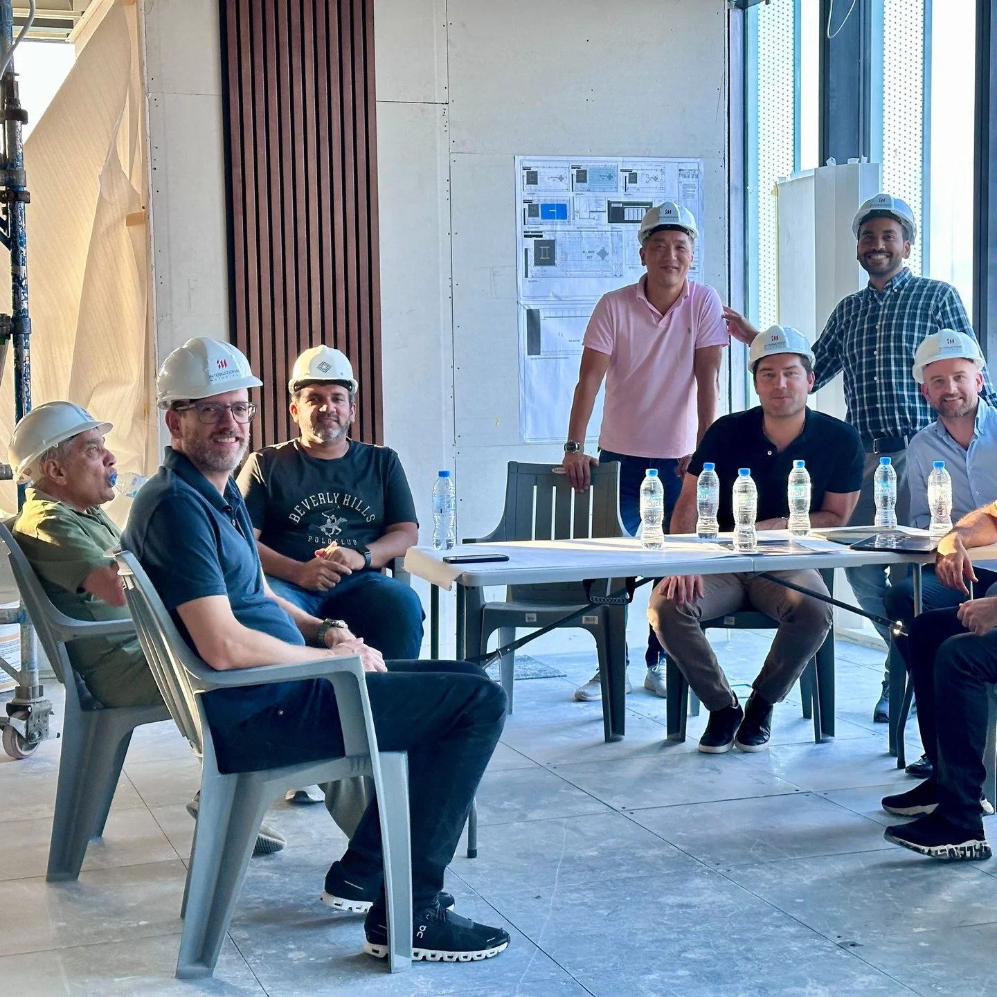 Modern office fitout with wooden panels and collaborative seating