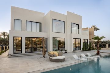 Photograph: the pool terrace, the finished villa, Cluster 39, Villa 1, Jumeirah Islands, by Fajr Interiors