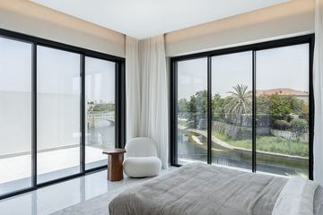 Photograph: bedroom, garden view, the finished villa, Cluster 39, Villa 1, Jumeirah Islands, by Fajr Interiors