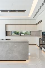 Photograph: the kitchen, the finished villa, Cluster 39, Villa 1, Jumeirah Islands, by Fajr Interiors