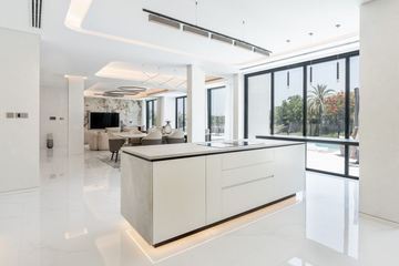 Photograph: kitchen and living, the finished villa, Cluster 39, Villa 1, Jumeirah Islands, by Fajr Interiors