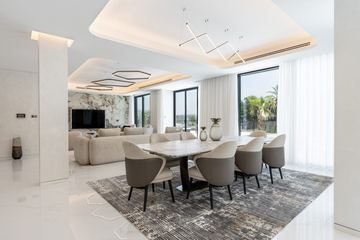 Photograph: dining and living, the finished villa, Cluster 39, Villa 1, Jumeirah Islands, by Fajr Interiors