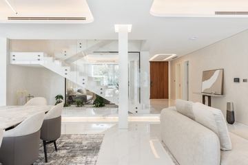 Photograph: the stair and living room, the finished villa, Cluster 39, Villa 1, Jumeirah Islands, by Fajr Interiors