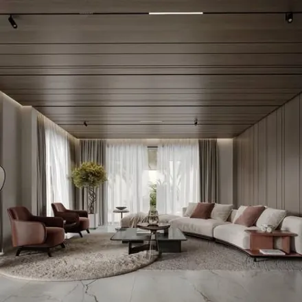 Villa living room under a timber-slatted ceiling